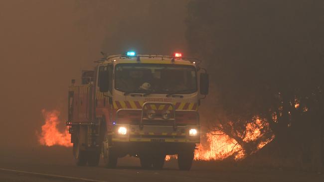 Fires stalk and RFS vehicle near Tahmoor. Picture: Dean Lewins/AAP