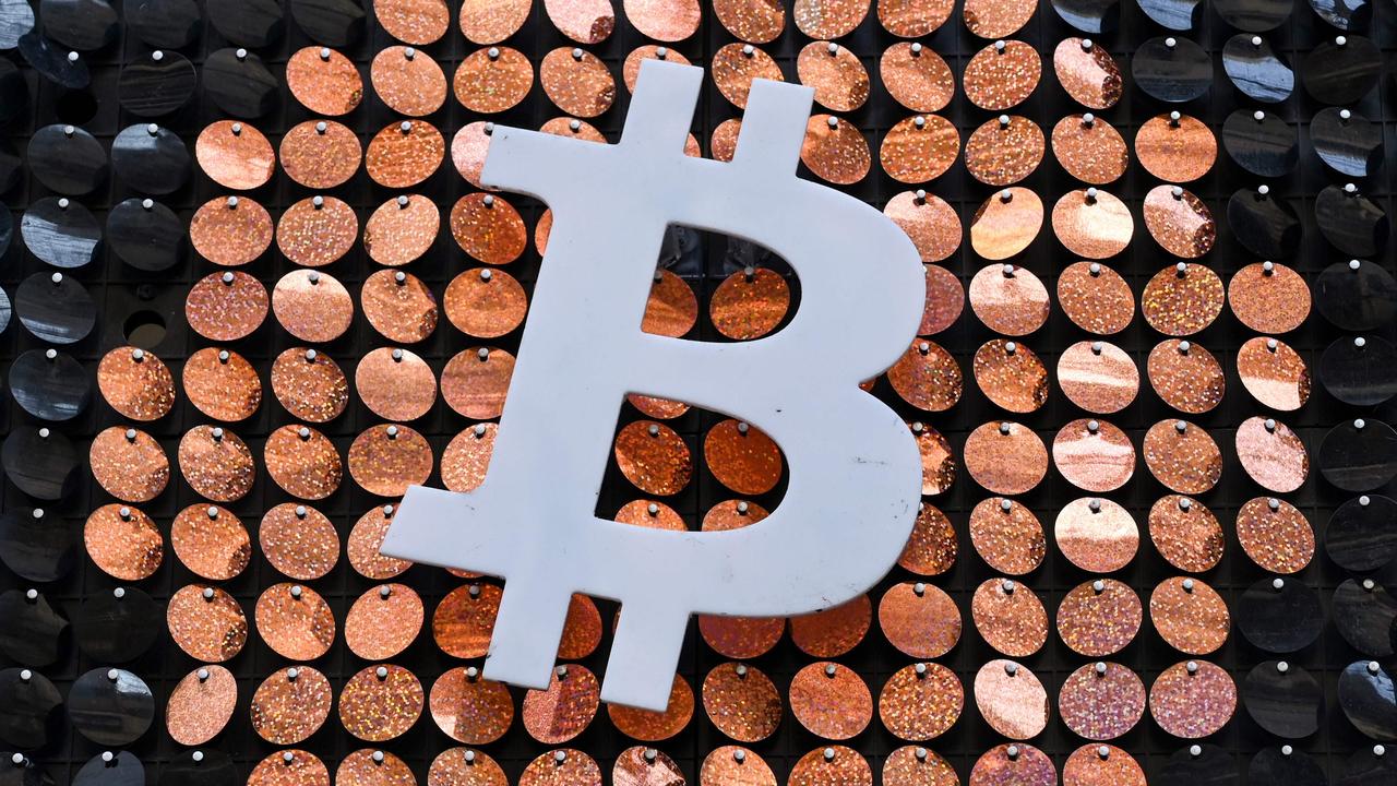 Experts can’t agree on whether bitcoin will continue to surge in value or come crashing down. Picture: Nicolas Tucat/AFP