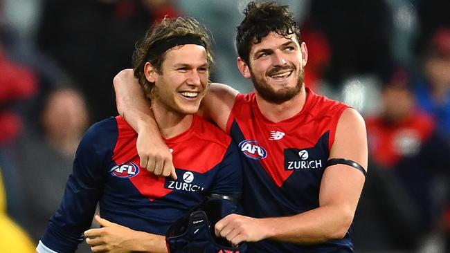 Ed Langdon and Angus Brayshaw celebrate after Melbourne’s win over Geelong. Picture: Getty Images