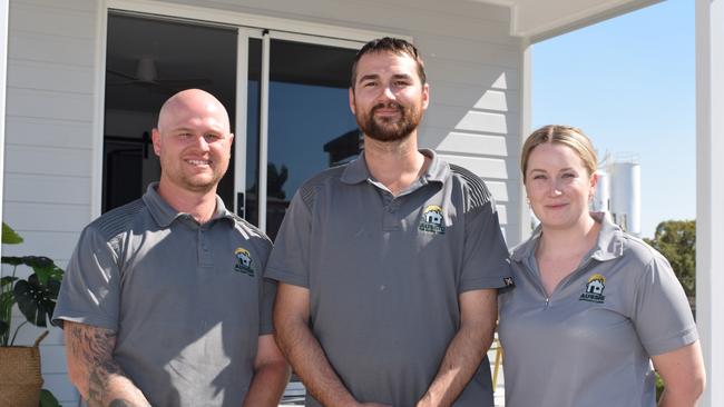 Aussie Tiny Homes and Cabins' Brendan Vine, Jeremy Power and Emma Power. Picture: Aden Stokes