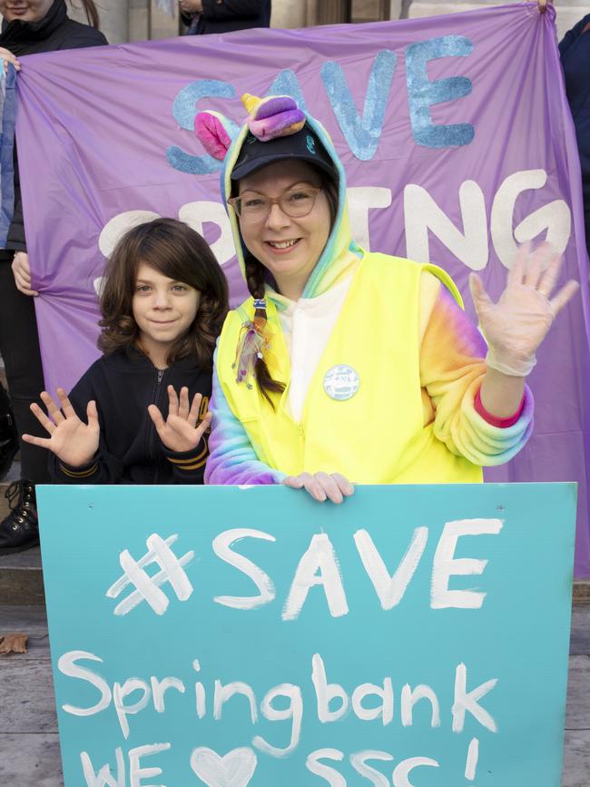 Springbank Secondary College parent Jody Moate with son Fred at the Parliament House Rally. Picture: Emma Brasier