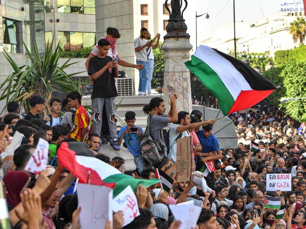 Protesters gather for an anti-Israel demonstration outside the French embassy headquarters along the Avenue Habib Bourguiba in the centre of Tunis. Picture: AFP