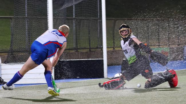 Isaac Farmilo pictured mid scoring shot. Picture: Hockey NT.