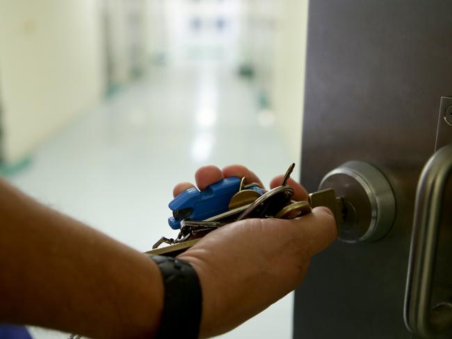 Tour of Woodford correctional centre. Pic of officer closing a cell door. Photo by Chris McCormack.