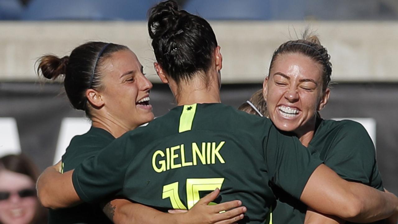 Alanna Kennedy celebrates her goal with Emily Gielnik.