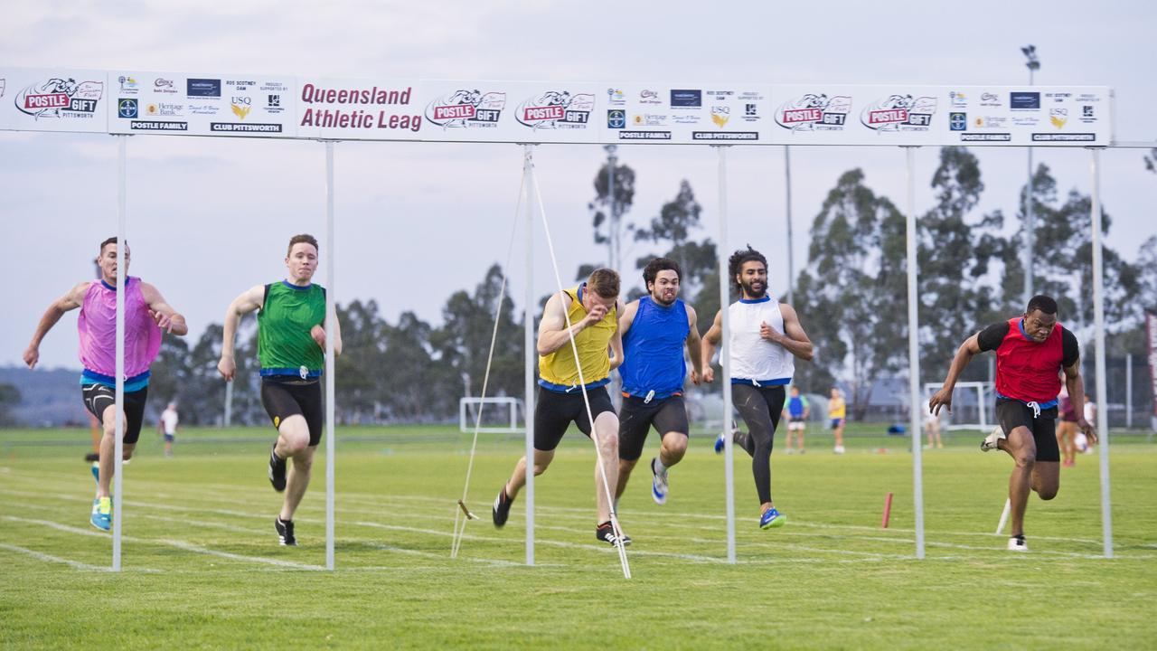 WINNING LUNGE: The field heads for the finish line in a qualifying heat during last year's Arthur Postle Gift at Club Pittsworth last year.