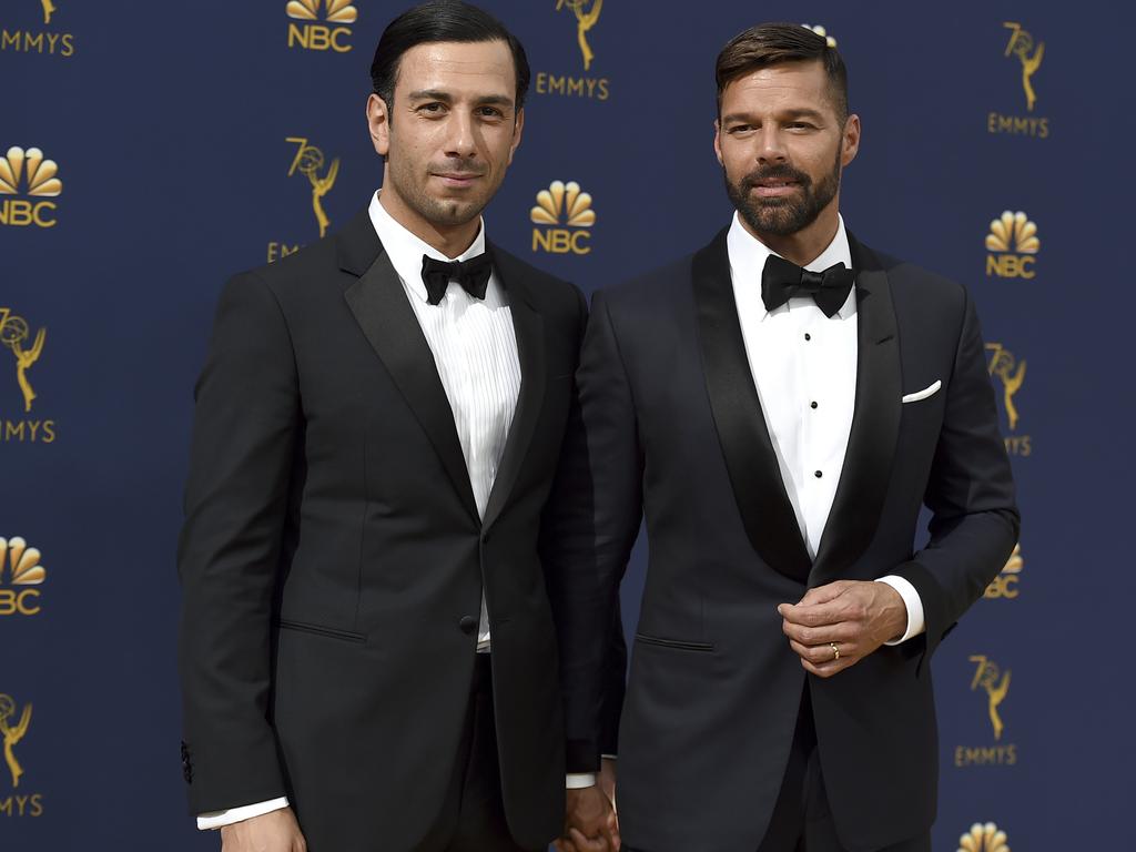 Jwan Yosef, left, and Ricky Martin announced the arrival of his daughter with an Instagram post showing off the infant’s tiny hands. Picture: Jordan Strauss/Invision/AP, File