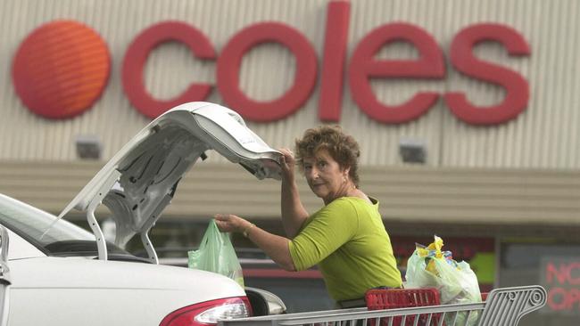 A Coles shopper and Coolangatta resident of Coolangatta, outside Coles supermarket at Tweed Heads on the NSW-Queensland border — where supermarkets are accustomed to cross-border restrictions. Pic Lyndon Mechielsen