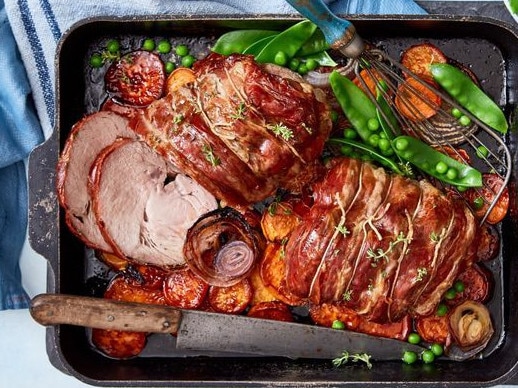 Prosciutto-wrapped roast pork.