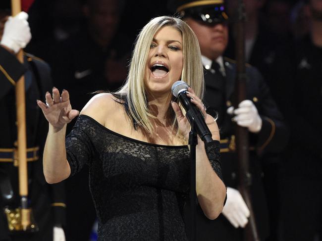 Singer Fergie performs the national anthem prior to an NBA All-Star basketball game, Sunday, Feb. 18, 2018, in Los Angeles. (AP Photo/Chris Pizzello)