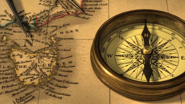 Map of Australia from 1826, showing Tasmania and SE coast with old type compass and dividers. Deliberately warm tone. Map is out of copyright.