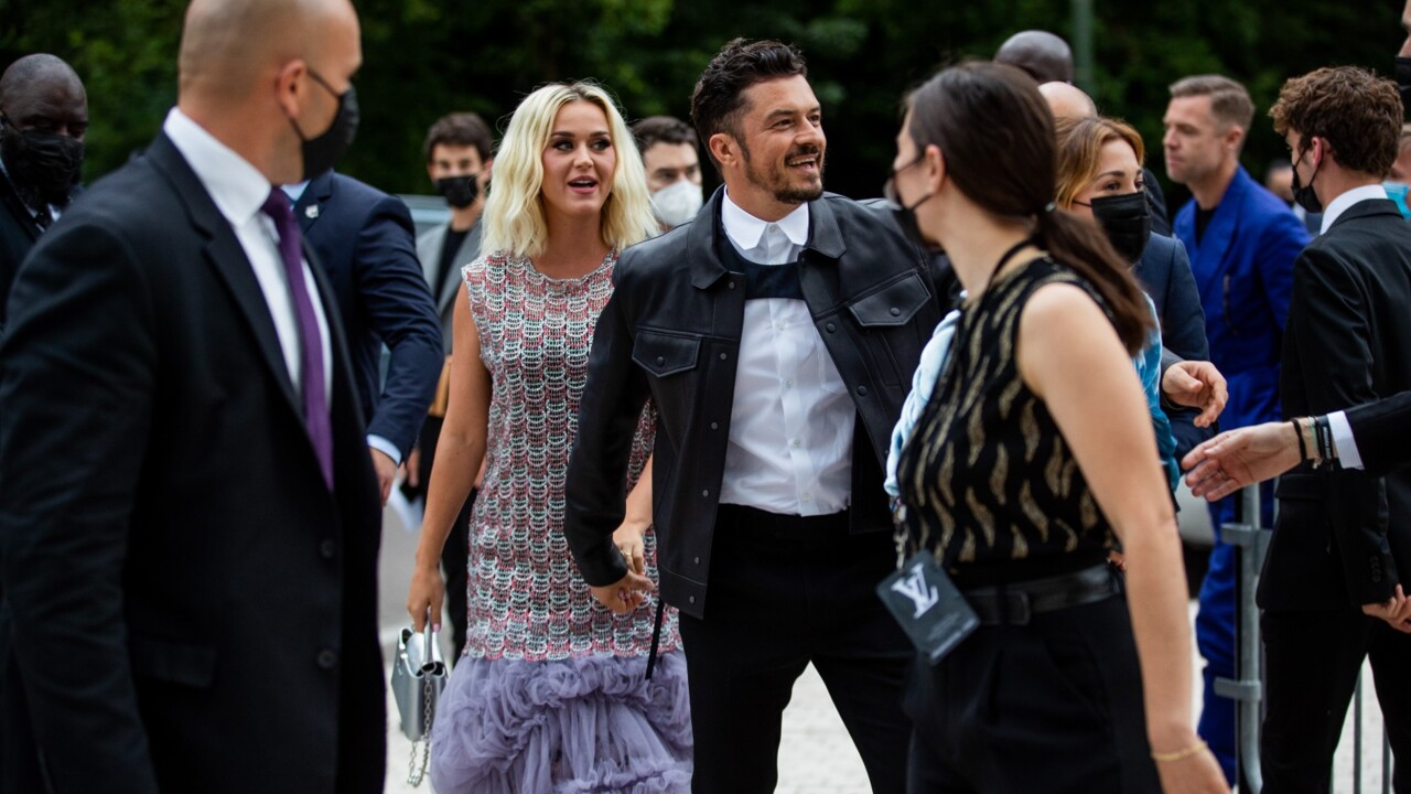 Katy Perry & Orlando Bloom look dashing at the Louis Vuitton show in Paris