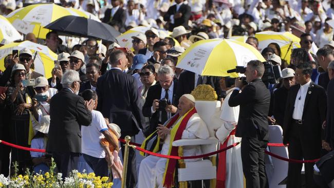 Pope Francis is seated before leading a holy mass at Tasitolu park in Dili, 2024. Picture; AP.