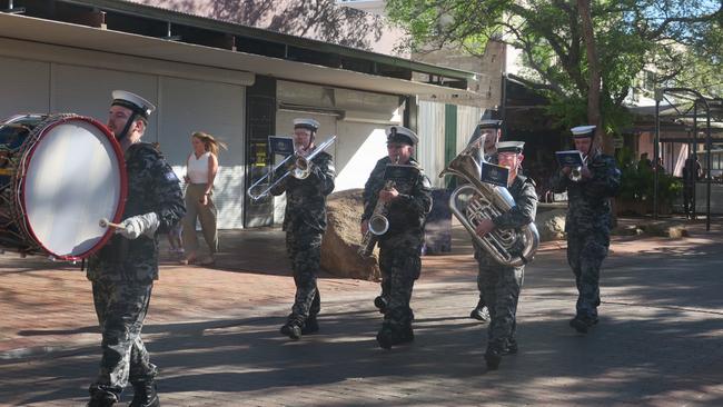 The band plays as the squadron make their way along the Todd Mall in Alice Springs. Picture: Laura Hooper.