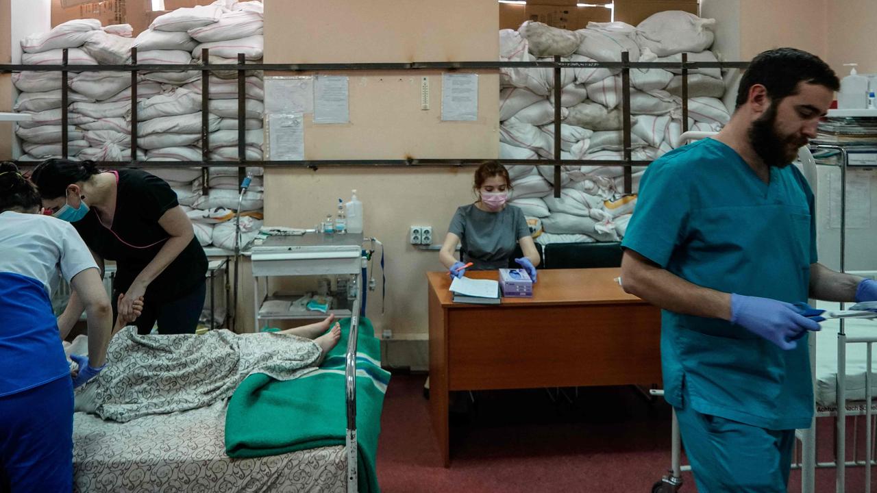 Doctors from the Ukrainian city of Zaporizhzhia are pictured here treating children believed to have fled from the besieged city. Picture: Emre Caylak/AFP