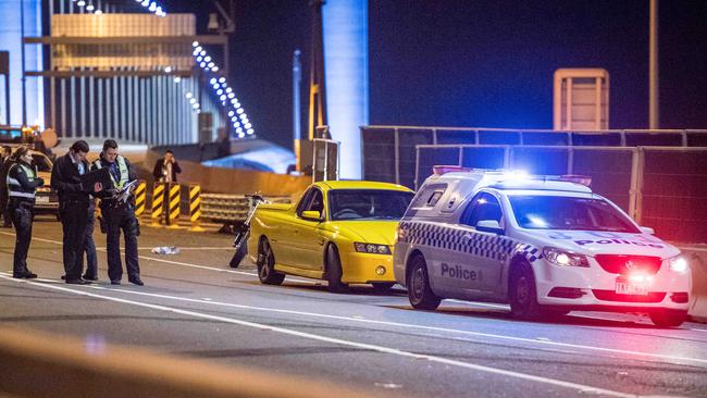 Police at the scene of the Bolte Bridge shooting. Picture: Jake Nowakowski