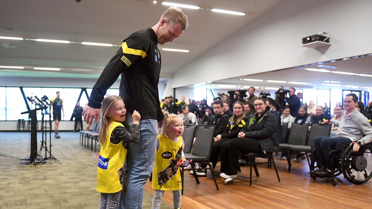 Jack Riewoldt and his daughters Poppy and Hazel after Riewoldt’s farewell press conference. Picture: Morgan Hancock/Getty Images