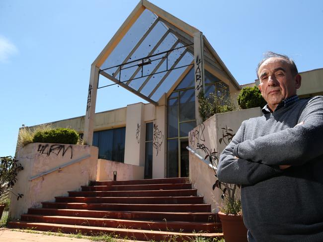 Former owner George Karastavrou at the disaster zone. Picture: Hamish Blair