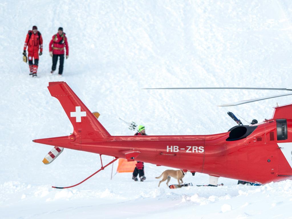 Desperate search for buried skiers after avalanche hits 