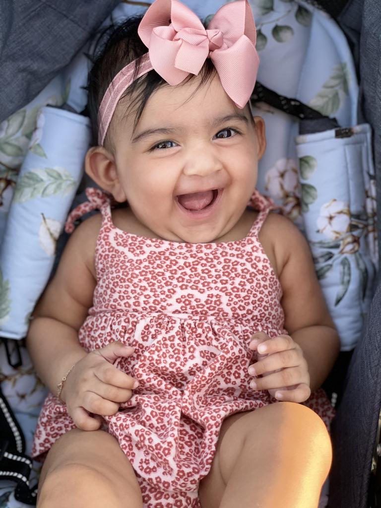 Anaisha was going for a beach walk and her daddy was playing peekaboo.That’s when she started giggling and mumma captured the amazing smile. Picture: Nikita