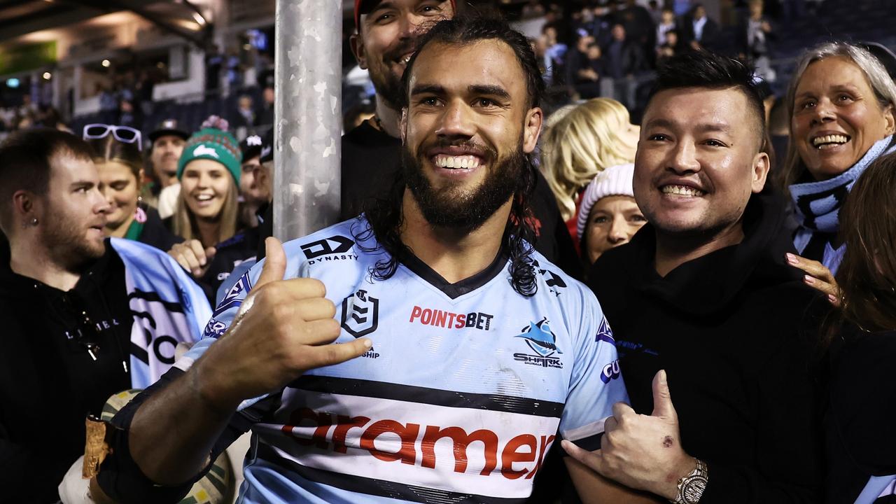 SYDNEY, AUSTRALIA - JULY 30: Toby Rudolf of the Sharks celebrates with fans after the round 20 NRL match between the Cronulla Sharks and the South Sydney Rabbitohs at PointsBet Stadium, on July 30, 2022, in Sydney, Australia. (Photo by Matt King/Getty Images)