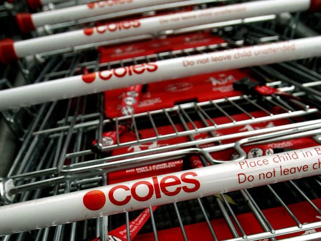 11 Mar 2004 Generic - stack of empty Coles supermarket shopping trolleys, in Sydney. shop shops logo logos