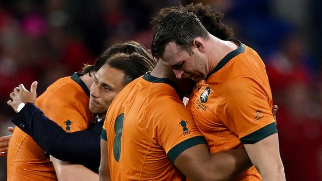 LYON, FRANCE - SEPTEMBER 24: Rob Valetini and Nick Frost of Australia look dejected as they embrace at full-time following the Rugby World Cup France 2023 match between Wales and Australia at Parc Olympique on September 24, 2023 in Lyon, France. (Photo by Hannah Peters/Getty Images)