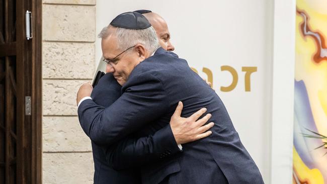 Scott Morrison embraces Josh Frydenberg at a Passover service in Melbourne. Picture: Jason Edwards