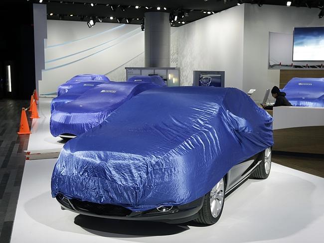 Still under wraps ... General Motors vehicles are under wraps at the Cobo Center, home of the North American International Auto Show in Detroit. Picture: AP