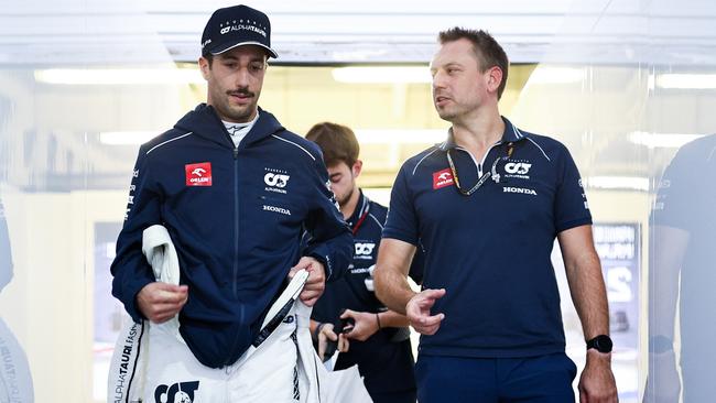 MEXICO CITY, MEXICO - OCTOBER 27: Daniel Ricciardo of Australia and Scuderia AlphaTauri talks with Jonathan Eddolls, Head of Trackside Engineering for Scuderia AlphaTauri in the Paddock after practice ahead of the F1 Grand Prix of Mexico at Autodromo Hermanos Rodriguez on October 27, 2023 in Mexico City, Mexico. (Photo by Jared C. Tilton/Getty Images)