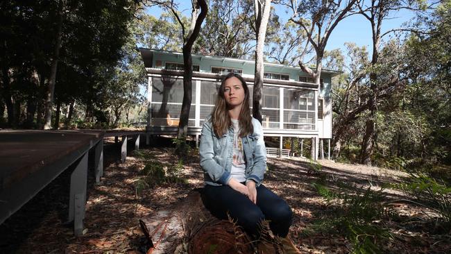 Paradie Lost: South Stradbroke Island Eco cabins residents have been without hot water and cooking facilities for two weeks after their gas system was removed over fears of a gas leak and explosion. It's just the latest in a long saga of issues that have plagued the island residents. Left to right, residents Sara Skipworth and  Eudes Zavarc in front of their cabin. Picture Glenn Hampson