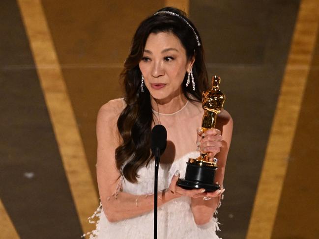 Malaysian actress Michelle Yeoh accepts the Oscar for Best Actress in a Leading Role. Picture: AFP