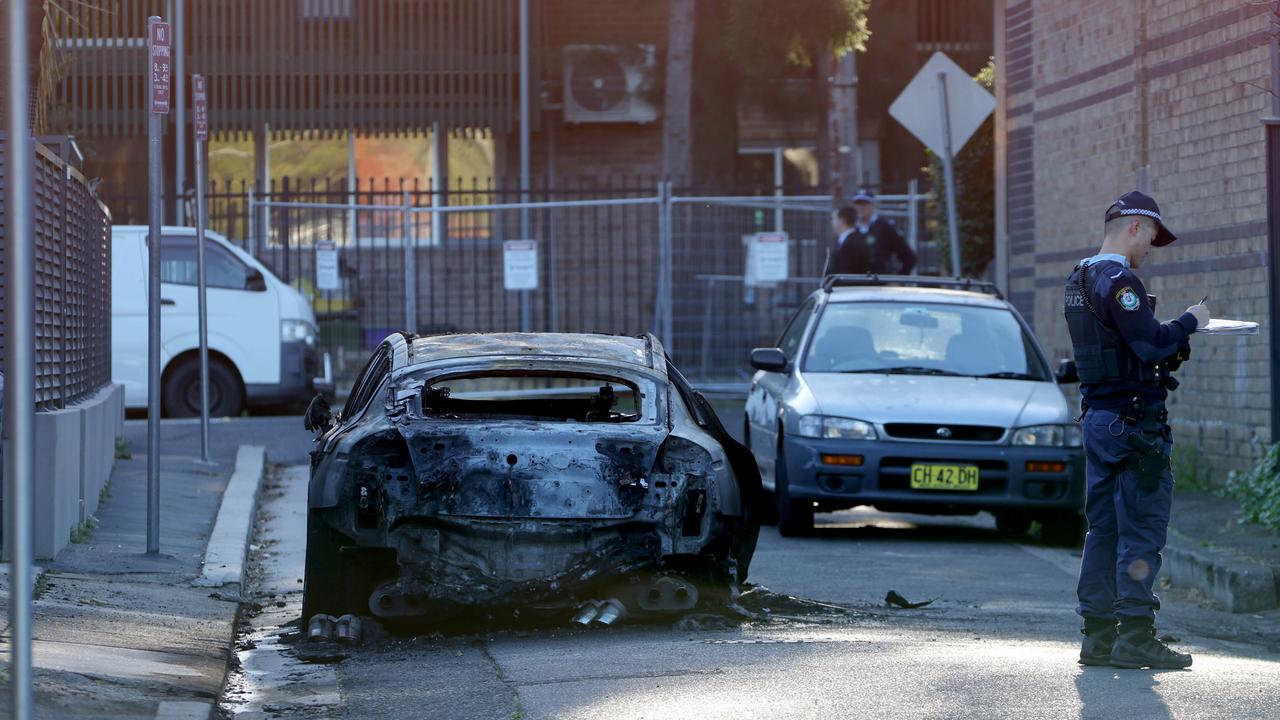 One of the two burnt-out cars found a short time after the incident. Picture: NCA NewsWire / Damian Shaw