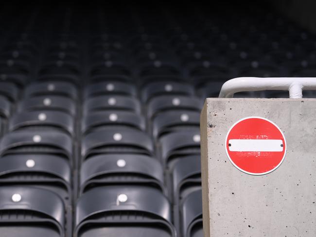 NEWCASTLE UPON TYNE, ENGLAND - JULY 26: A detail view of a "no entry" sign in the stands during the Premier League match between Newcastle United and Liverpool FC at St. James Park on July 26, 2020 in Newcastle upon Tyne, England. Football Stadiums around Europe remain empty due to the Coronavirus Pandemic as Government social distancing laws prohibit fans inside venues resulting in all fixtures being played behind closed doors. (Photo by Laurence Griffiths/Getty Images)