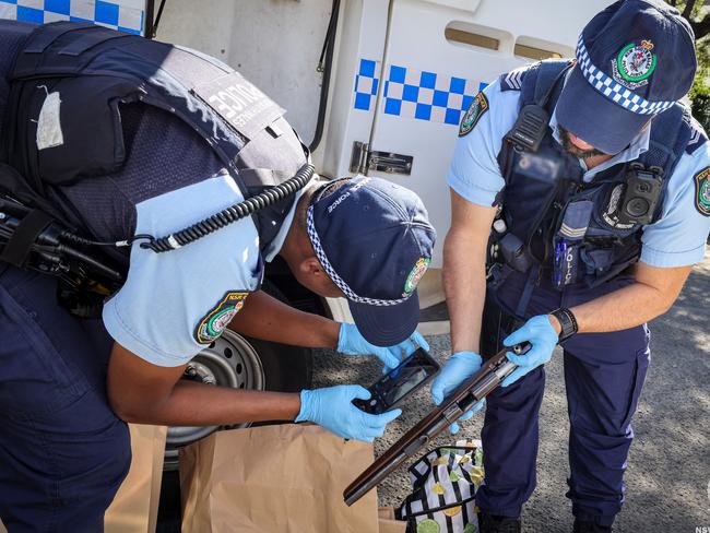 A disqualified driver is in custody and a sawn-off rifle and a balaclava have been seized at Summer Hill. Picture: NSW Police