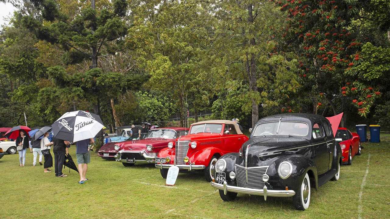 The classic American section cops a soaking at the Noosa Classic Car Show. Picture: Iain Curry