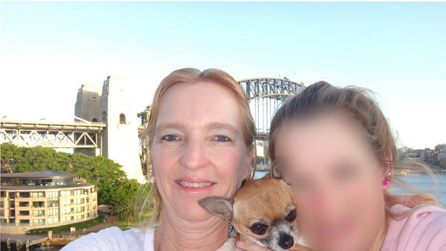 Maree Mavis Crabtree, a Gold Coast mother who has been charged with murdering two of her children and gaining financial benefit from their insurance payouts. Seen here with one of surviving daughters in Sydney.