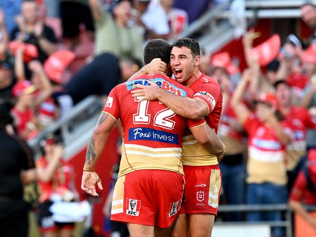 Sean O'Sullivan and Kenny Bromwich of the Dolphins celebrate the Dolphins first ever victory in the NRL after the round one NRL match between the Dolphins and Sydney Roosters at Suncorp Stadium on March 05, 2023 in Brisbane, Australia. (Photo by Bradley Kanaris/Getty Images)