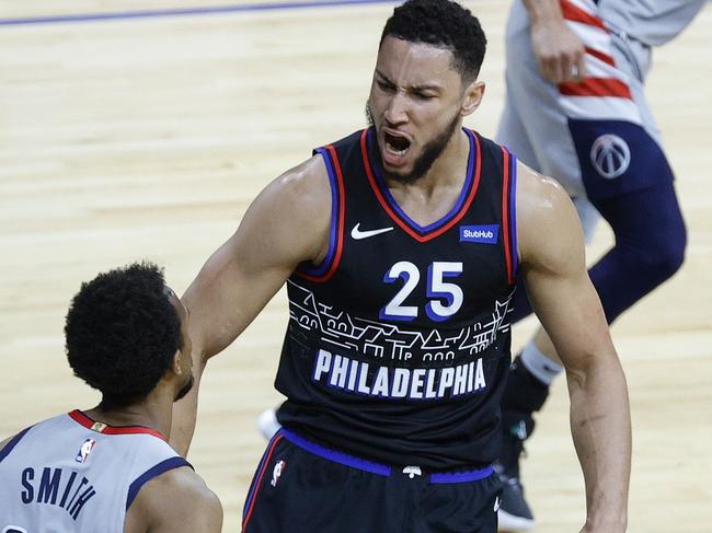 PHILADELPHIA, PENNSYLVANIA - MAY 26: Ben Simmons #25 of the Philadelphia 76ers celebrates a dunk during the first quarter against the Washington Wizards during Game Two of the Eastern Conference first round series at Wells Fargo Center on May 26, 2021 in Philadelphia, Pennsylvania. NOTE TO USER: User expressly acknowledges and agrees that, by downloading and or using this photograph, User is consenting to the terms and conditions of the Getty Images License Agreement.   Tim Nwachukwu/Getty Images/AFP == FOR NEWSPAPERS, INTERNET, TELCOS & TELEVISION USE ONLY ==