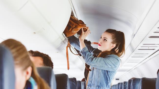 No one likes the passenger who takes up too much overhead luggage space. Picture: iStock