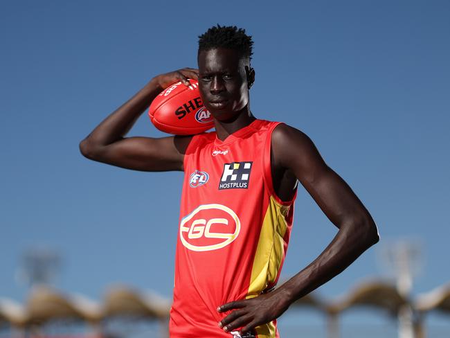 GOLD COAST, AUSTRALIA - APRIL 20: Mac Andrew poses during a portrait seesion at Metricon Stadium  on April 20, 2022 in Gold Coast, Australia. (Photo by Chris Hyde/AFL Photos/Getty Images)