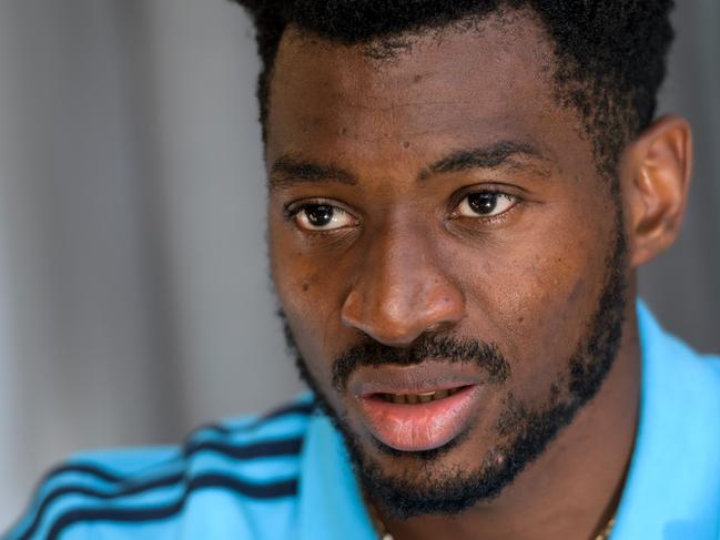 (FILES) In this file photo taken on July 16, 2017 Olympique de Marseille's Cameroonian midfielder Andre-Frank Zambo Anguissa speaks during an interview with AFP, during a pre-season training camp of the French football club in Lausanne. - Cameroonian midfielder Andre-Frank Zambo Anguissa has been transferred to Fulham, the London-based club which has been promoted to the Premier League, announced on August 9, 2018. (Photo by Fabrice COFFRINI / AFP)