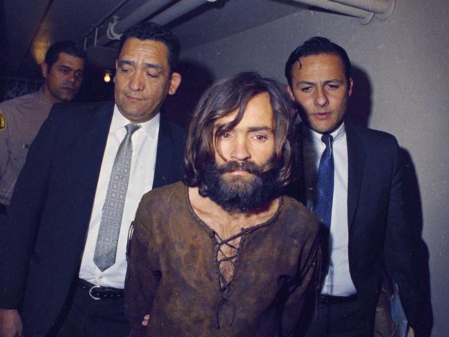 Charles Manson being escorted to his arraignment on conspiracy-murder charges in connection with the Sharon Tate murder case. Picture: AP