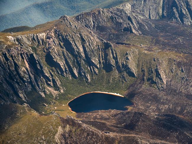 2019 Tasmanian bush fires. Lake Rhona and Denison Range, Gell River Fire - at Southwest National Park. . Picture - LUKE TSCHARKE / PAR AVION