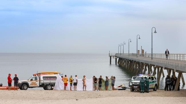 Paramedics at Glenelg, where 15-year-old Eliase Nimbona drowned on Monday evening. Picture: AAP / Russell Millard