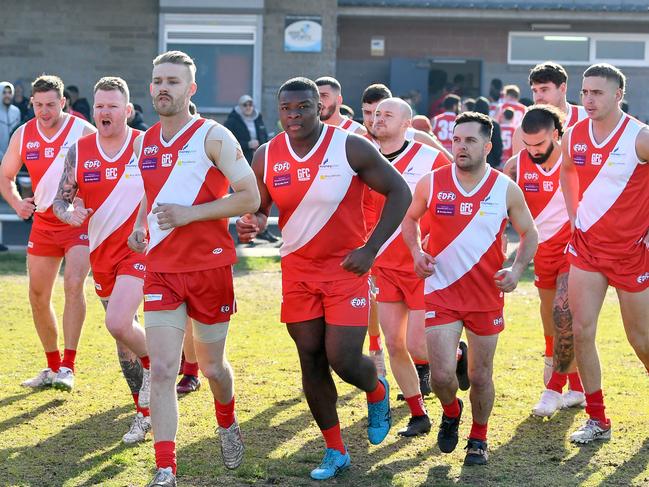 Glenroy run out onto the field during the round twelve EDFL Strathmore Community Bank Division Two match between Glenroy and Hadfield at Sewell Reserve, on July 06, 2024, in Melbourne, Australia. (Photo by Josh Chadwick)