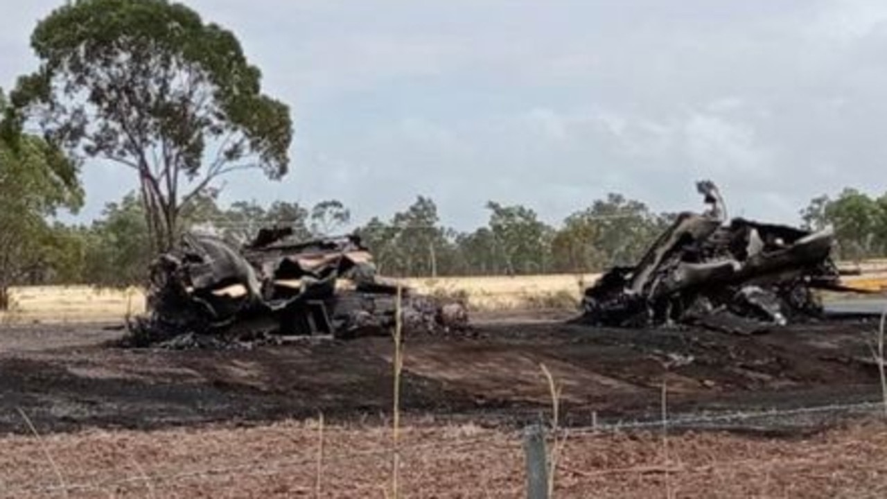 The charges remains of two fuel tanker trailers – that had been carrying 50,000 litres of diesel – on the Peak Downs Hwy after they were engulfed by fire at Nebo. Picture: Kaiz-Anne Bryan