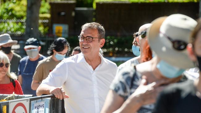 Premier Steven Marshall in a queue prior to voting in the state election at Norwood Primary School. Picture: NCA NewsWire / Brenton Edwards