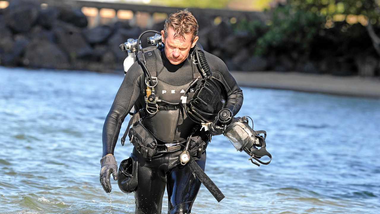 Police divers looking for evidence at Jack Evans boat harbour after a baby girl was found dead on a Gold Coast beach. Picture: AAP - John  Gass