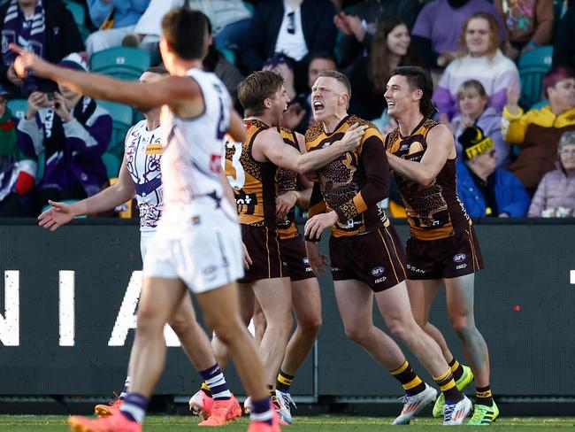 LAUNCESTON, AUSTRALIA - JULY 13: James Sicily of the Hawks celebrates a goal during the 2024 AFL Round 18 match between the Hawthorn Hawks and the Fremantle Dockers at the UTAS Stadium on July 13, 2024 in Launceston, Australia. (Photo by Michael Willson/AFL Photos via Getty Images)